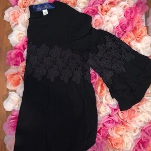 Worn once Francesca’s three quarter sleeve blouse